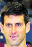 Serbinn Novak Djokovic sigraði Roger Federer frá Sviss í úrslitaleik...